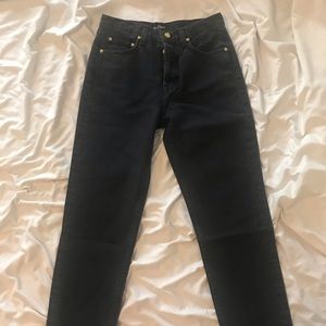 Black vintage style denim jeans like Rouje, Levis